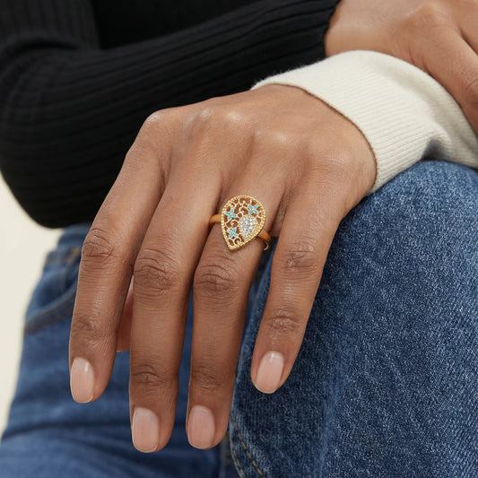 Hand-crafted filigree blooms in 18K gold Ring