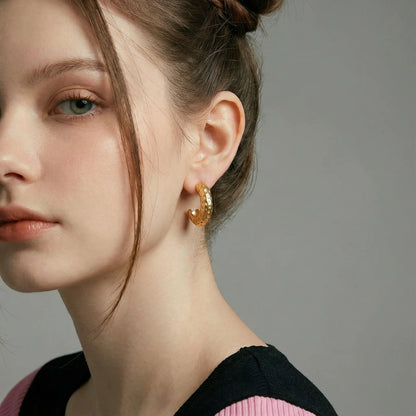 Hand-textured 14K Gold and Steel Dimpled Glow Hoops