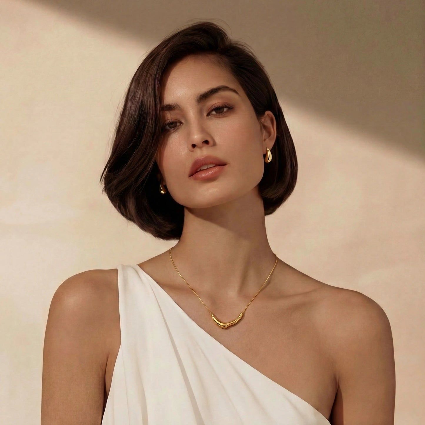 Golden Teardrop Studs by Gabriella's Jewels