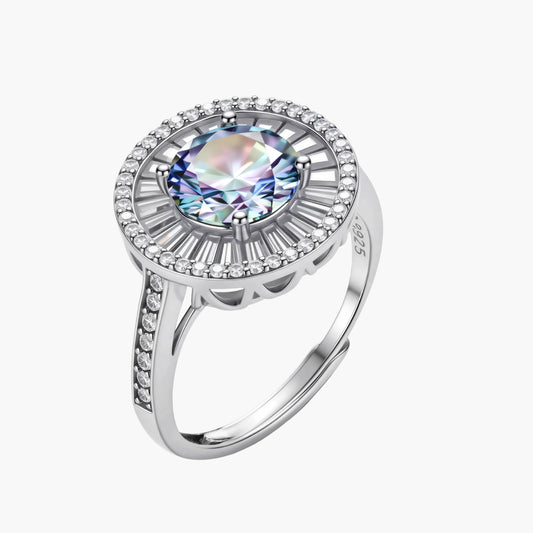 Close-up of sterling silver halo ring with round rainbow moissanite center stone surrounded by baguette-cut stones
