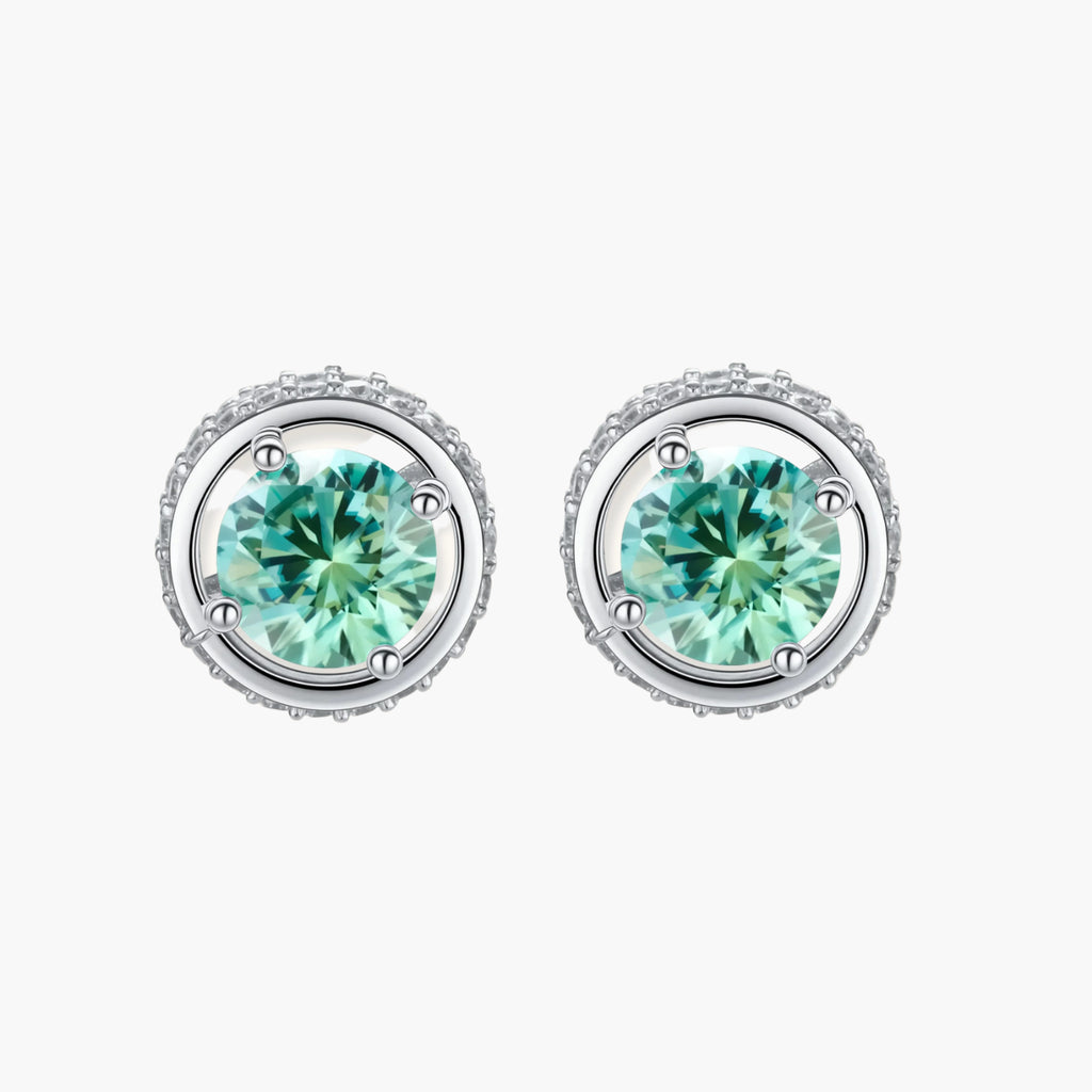 Round green moissanite stud earrings in sterling silver halo settings with brilliant sparkle on white background.