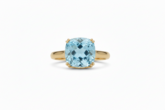 14 Karat Gold Precision Cut Sky Blue Topaz Ring