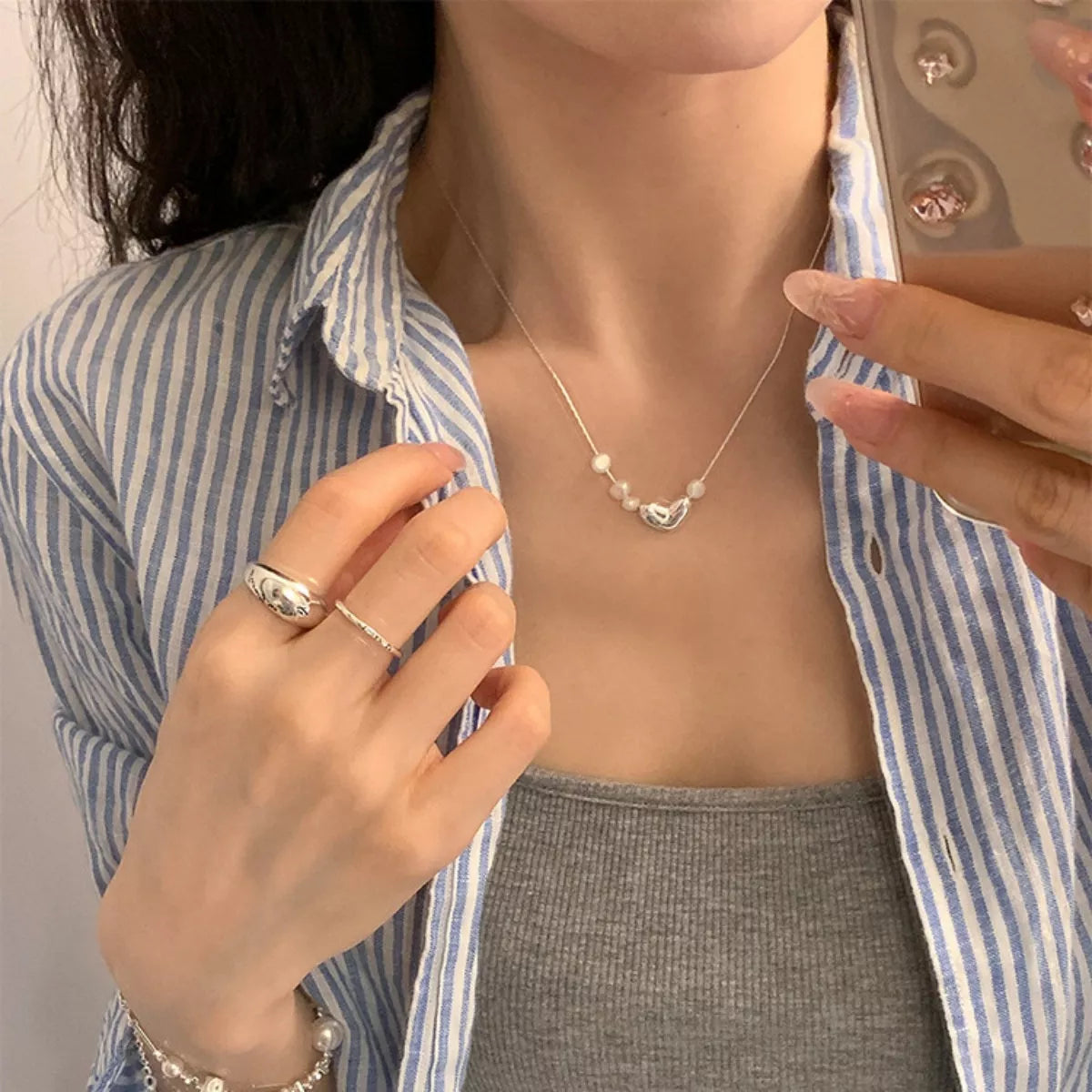 “Affordable jewelry under $50 from Gabriella’s Jewels including necklaces, rings, bracelets, and earrings.”